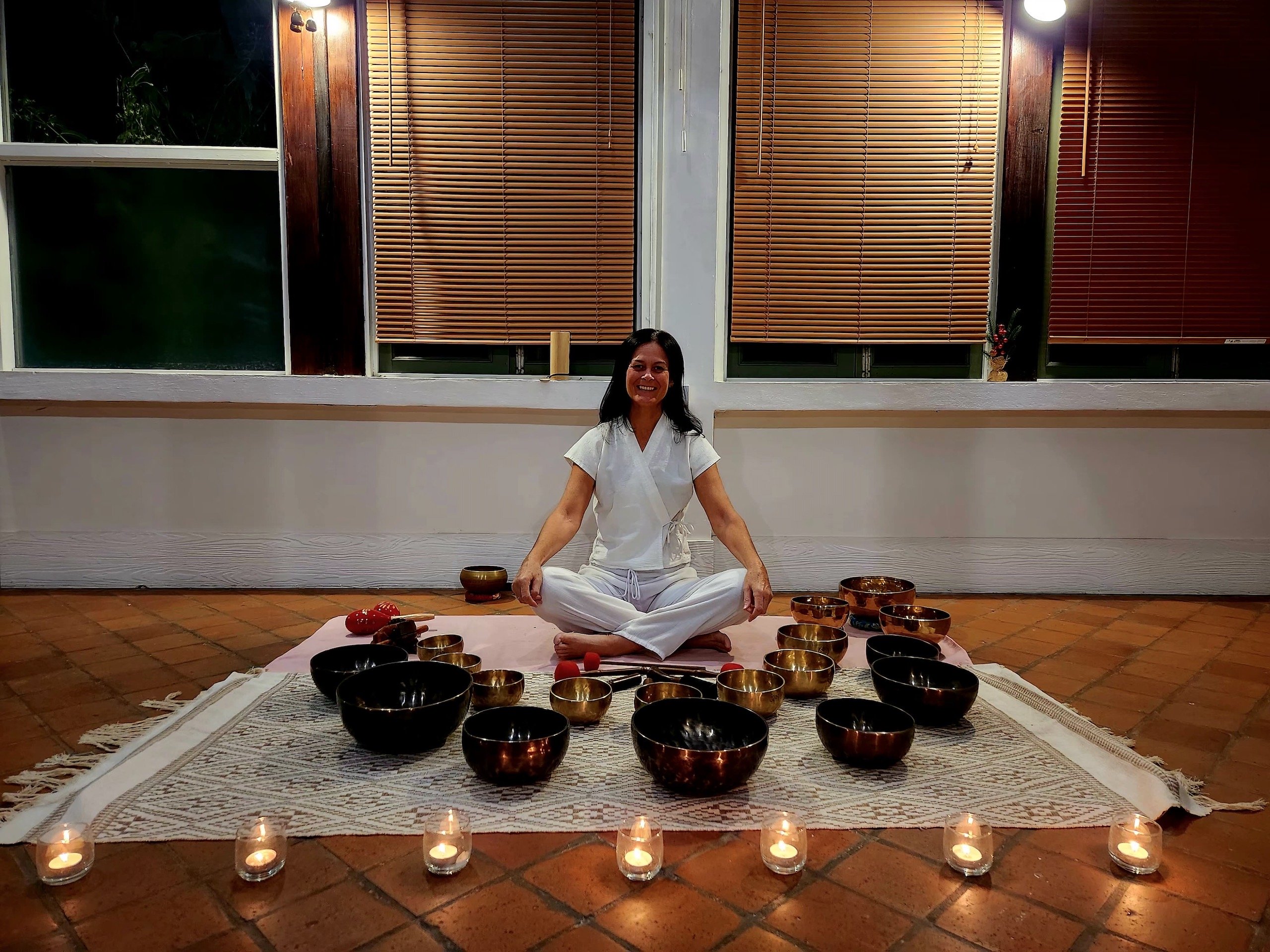 Tibetan singing bowls set up for a private session in Sound Healing and Massage in Luang Prabang